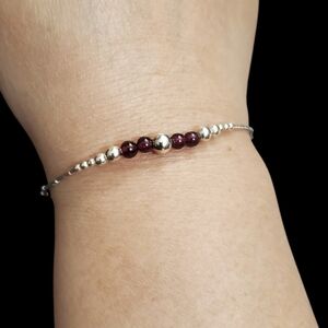 Vtg. Liquid Silver Garnet Bracelet